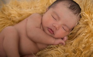 Newborn Sleeping on Faux Fur